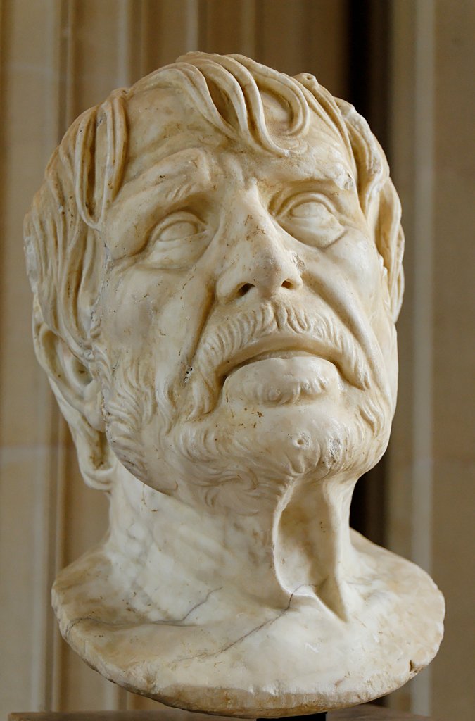 Vermeintliches Porträt des Dichters Hesiod, lange Zeit für eine Büste Senecas gehalten, daher der Name "Pseudo-Seneca". Marmor, im Flussbett bei Auch entdeckt.