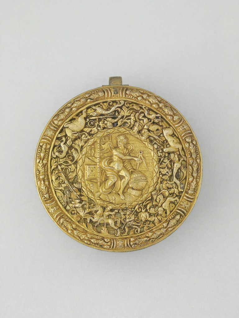 Trommelförmige Uhr aus Stahl und Messing, mit teilweise durchbrochenem, gegossenem und ziseliertem Gehäuse, Deutschland um 1550.